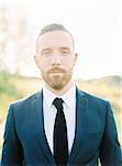 Sweden, Portrait of groom in sunlight