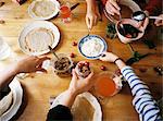 Sweden, People eating breakfast at table