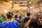 Crowd throwing flower petals during the Flower Holi Festival, Vrindavan, Uttar Pradesh, India, Asia