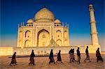 People walking to pray in front of the Taj Mahal, UNESCO World Heritage Site, Agra, Uttar Pradesh, India, Asia