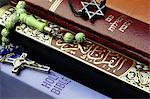 Bibles and Quran, interfaith symbols of Christianity, Islam and Judaism, the three monotheistic religions, Haute-Savoie, France, Europe