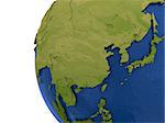 Asia on detailed model of planet Earth with visible country borders on green land and waves on the ocean waters.