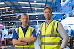 Portrait confident supervisors in steel factory