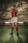 Portrait of Japanese rugby player with ball