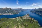 Aerial view of the village of Bellagio frames by the blue water of Lake Como on a sunny spring day, Italian Lakes, Lombardy, Italy, Europe