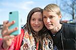 Sweden, Stockholm, Ostermalm, Two women taking selfie