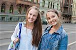 Sweden, Vastra Gotaland, Gothenburg, Portrait of two smiling girls (14-15)