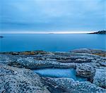 Sweden, Stockholm archipelago, Sodermanland, Femore, Eroded rock formations on coastline