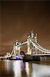 UK, England, London, Illuminated Tower Bridge over Thames River at night