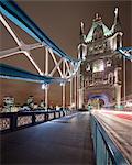 UK, England, London, Pedestrian walkway of Tower Bridge at night