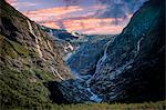 Norway, Vastlandet, Sogn og Fjordane, Stryn, Kjenndalsbreen Glacier, Scenic view of landscape at sunrise