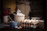 Valentine's Day baking, baking ingredients, tray of eggs, bowl of flour and sugar.