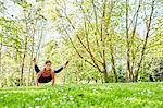 Woman balancing on hands in yoga position