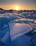 Stacked broken ice at sunset, Baikal Lake, Olkhon Island, Siberia, Russia