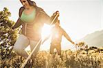 Couple running in field