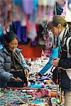 Shopping for souvenirs in Namche Bazaar, the main town during the Everest base camp trek, Nepal, Asia