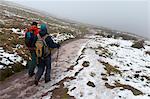 Hikers descend from Pen-Y-Fan summit in The Brecon Beacons National Park, Powys, Wales, United Kingdom, Europe