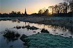 Burford church and River Windrush on frosty winter morning, Burford, Cotswolds, Oxfordshire, England, United Kingdom, Europe