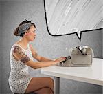 Pretty pin-up girl writes with a typewriter