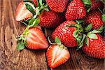 Fresh organic ripe strawberry on wooden table