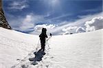 Two hikers on snow plateau. Turkey, Central Taurus Mountains, Aladaglar (Anti-Taurus), plateau Edigel (Yedi Goller)