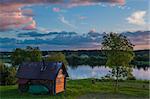 Wooden house on the Pasha river, Russia