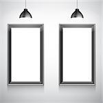 Two blank white poster frames inside gallery interior. Poster mock-up template