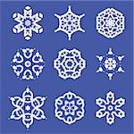 Set of Different  Ornamental Rosettes Isolated on Blue Background