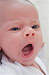 Portrait of baby boy yawning