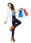 Shopping. The French way. Full length portrait of smiling young woman with French flag colours shopping bags posing on white background