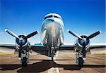 old airplane on a runway ready for take off