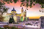 Madrid, Spain at La Almudena Cathedral and the Royal Palace.