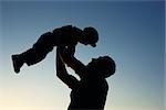 very nice silhouette of father and son