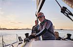 Portrait confident man sailing sailboat