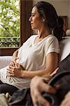 Pregnant woman thinking about her private future