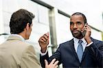 Businessman talking on cell phone