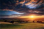 England, Calderdale. Sunset over the rolling hills viewed from Norland near Halifax.