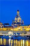 Germany, Saxony, Dresden, Altstadt (Old Town).The cupola of the Frauenkirche above buildings on the the Elbe River at night.