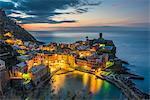 Vernazza, Cinque Terre, La Spezia, Liguria, Italy. The iconic view of Vernazza at sunrise seen from the hill.