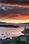 Scotland, Oban. A sunset view over the town, to the Hebridean Islands of Kerrera and Mull.