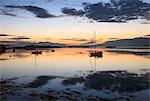 Scotland, Argyll and Bute, Connel. Boats on Loch Etive at sunset.