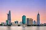 Bitexco Financial Tower and central Ho Chi Minh City (Saigon) skyline at sunset, Vietnam