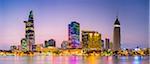 Central Ho Chi Minh City (Saigon) skyline and Saigon River at dusk, Vietnam