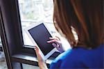 Nurse using digital tablet in the hospital