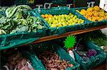 Variety of vegetables and fruits on shelf in supermarket