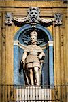 Statue of Philip II on the West building at Piazza Vigliena (Quattro Canti) on Corso Vittorio Emanuele in historic center of Palermo in Sicily, Italy