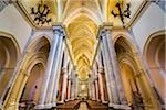 Architectural interior showing the main aisle lined with pilars in the elegant Royal Cathedral (Real Duomo) in historic Erice in Sicily, Italy