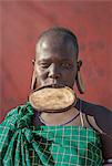 Woman of the Mursi Tribe with disc in her lower lip, Omo Valley, Ethiopia