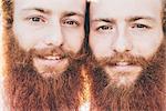 Close up portrait of young male hipster twins with red beards