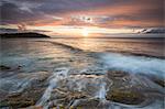 Waves crash on cliffs under a colorful Caribbean sunset, Galley Bay, St. John's, Antigua, Antigua and Barbuda, Leeward Islands, West Indies, Caribbean, Central America